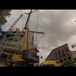 Maxim Grove GMK 6450 erects a tower crane