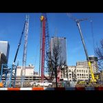 Maxims gmk 7550 erecting tower cranes at louisville omni hotel